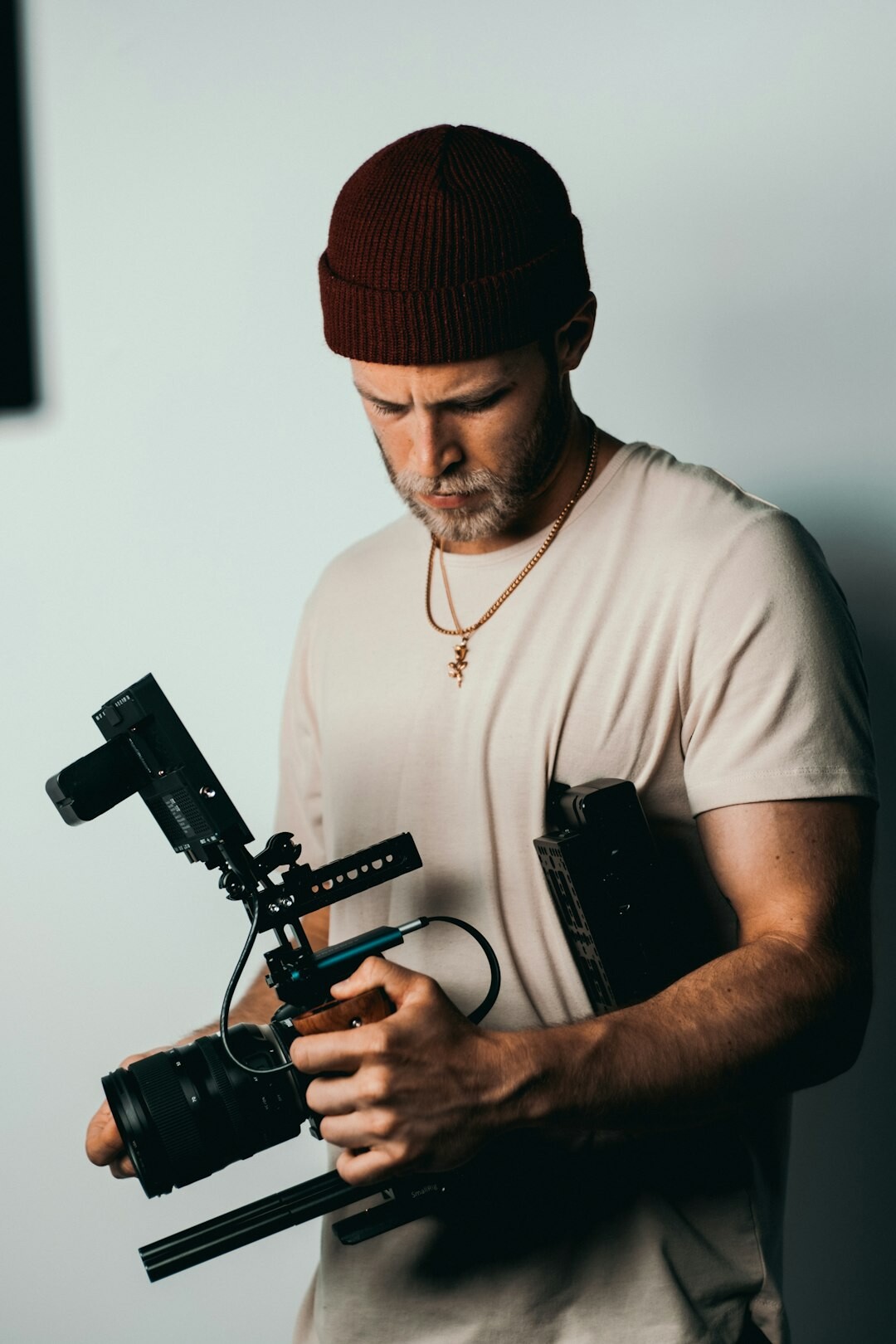 photographer with camera interviewing subject