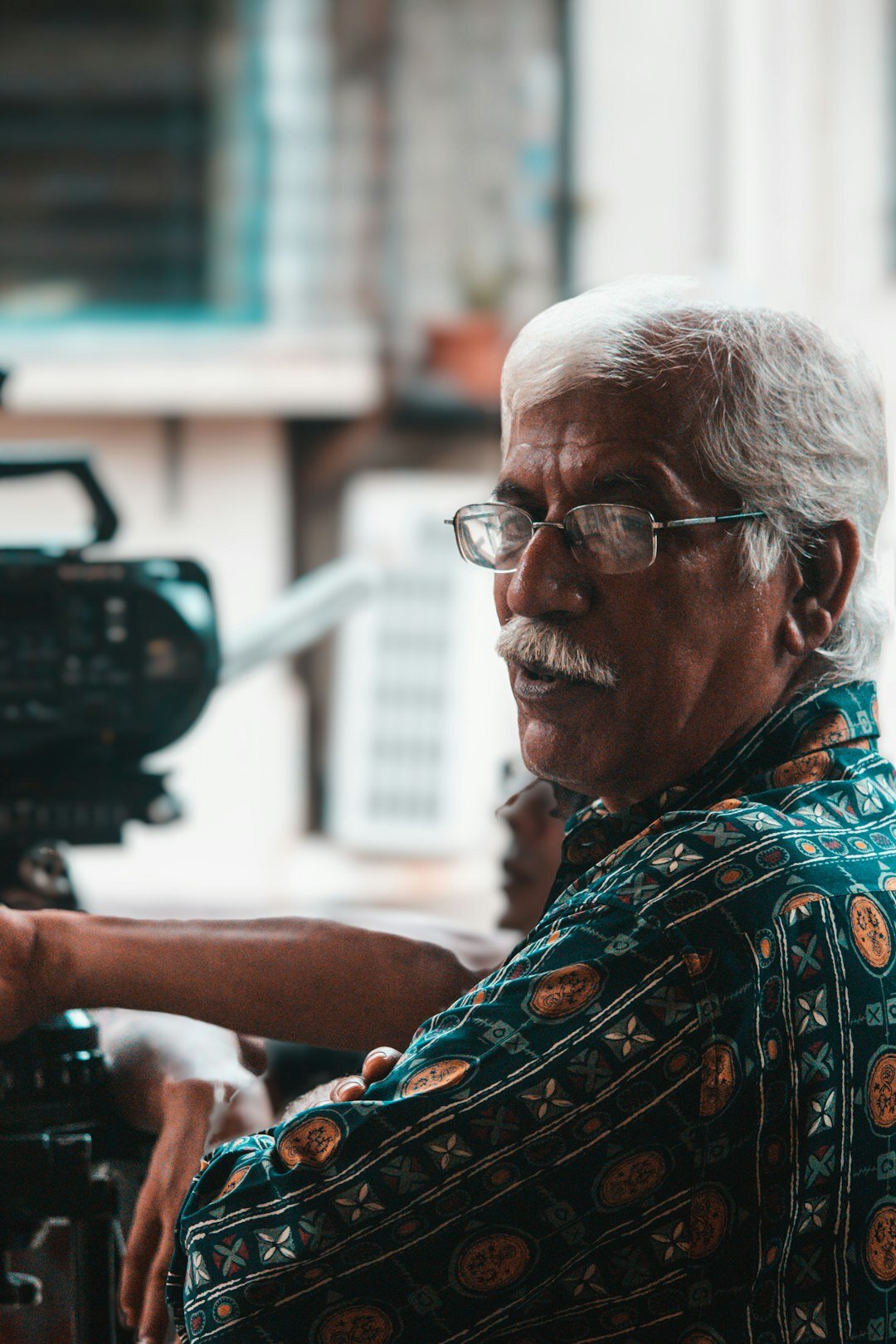 photographer interviewing elderly person